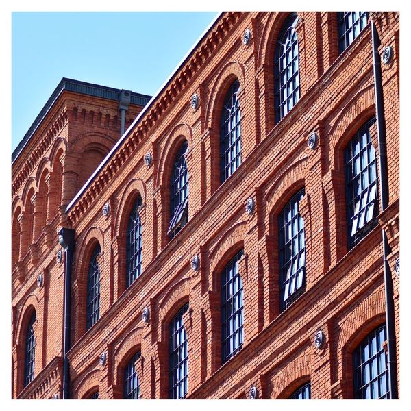 exterior of large, old brick building
